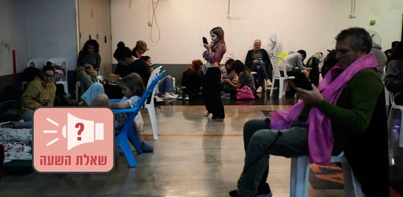 אנשים במקלט בעת התקפת טילים מאיראן / צילום: ap, Ohad Zwigenberg אנשים במקלט בעת התקפת טילים מאיראן / צילום: ap, Ohad Zwigenberg