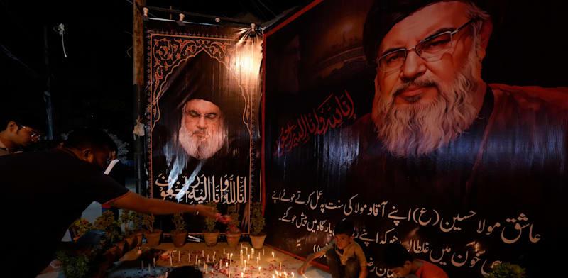 מוסלמים שיעים מתאבלים על חסן נסראללה, פקיסטן / צילום: ap, Fareed Khan מוסלמים שיעים מתאבלים על חסן נסראללה, פקיסטן / צילום: ap, Fareed Khan