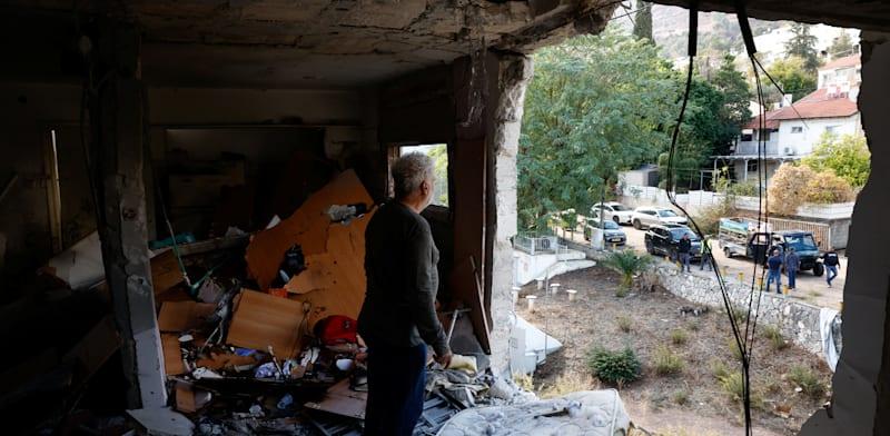 בית שנפגע בקריית שמונה, בשבוע שעבר / צילום: Reuters, Thomas Peter בית שנפגע בקריית שמונה, בשבוע שעבר / צילום: Reuters, Thomas Peter