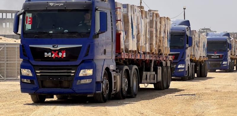 משאיות סיוע הומניטרי בעזה / צילום: Reuters, Gaza Humanitarian Foundation משאיות סיוע הומניטרי בעזה / צילום: Reuters, Gaza Humanitarian Foundation