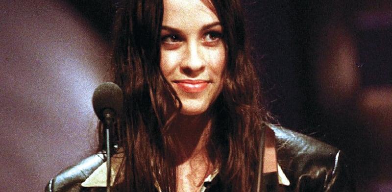 אלאניס מוריסט מקבלת את פרס הג'ונו על אלבום השנה, 1996 / צילום: Reuters, Mike Blake אלאניס מוריסט מקבלת את פרס הג'ונו על אלבום השנה, 1996 / צילום: Reuters, Mike Blake